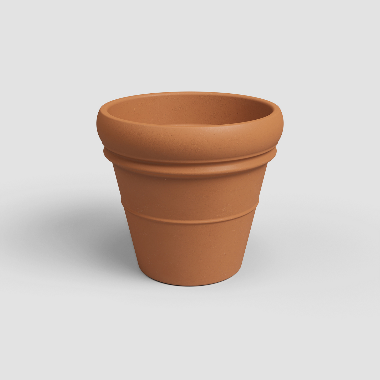 Bordato Terracotta Planter with Drainage | 12 inch Diameter — empty planter, terracotta planter, studio photo — planter for sale by Promise Supply for delivery and pickup in Toronto.