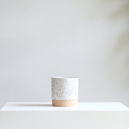 Briar Speckled Planter with Drainage and Tray | 6 Inch Diameter — empty planter, studio photo — planter for sale by Promise Supply for delivery and pickup in Toronto.