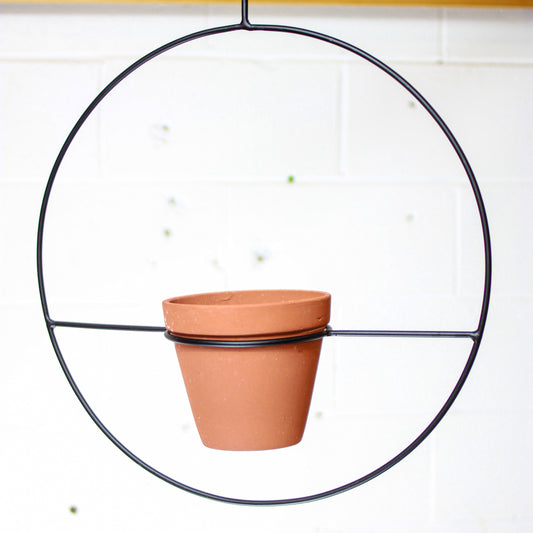 Black Iron with Terracotta Modern Hanging Planter | 5 inch Nursery Pot — empty planter, terracotta planter, studio photo — planter for sale by Promise Supply for delivery and pickup in Toronto.