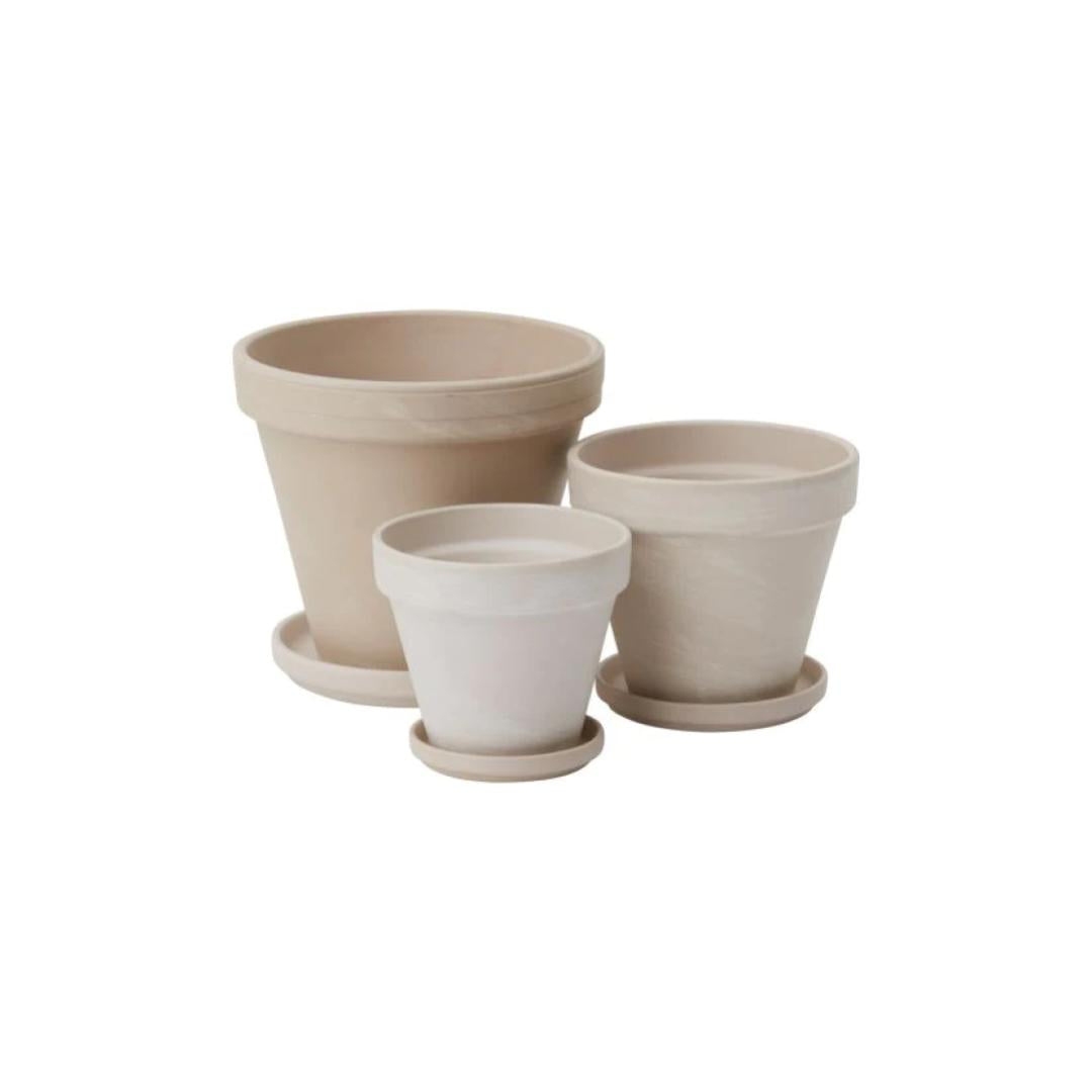 Apollo Beige Clay Planter with Drainage and Tray | 6 inch Diameter — empty planter, studio photo — planter for sale by Promise Supply for delivery and pickup in Toronto.