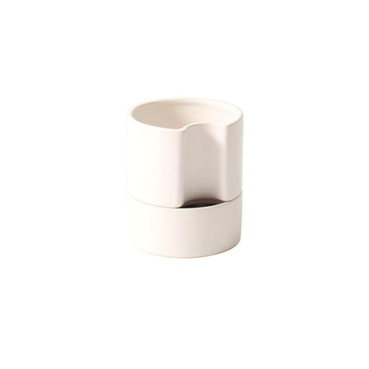 Jett Self-Watering Ceramic Pot with Drainage and Tray | 4 inch Diameter — empty planter, ceramic planter, studio photo — planter for sale by Promise Supply for delivery and pickup in Toronto.