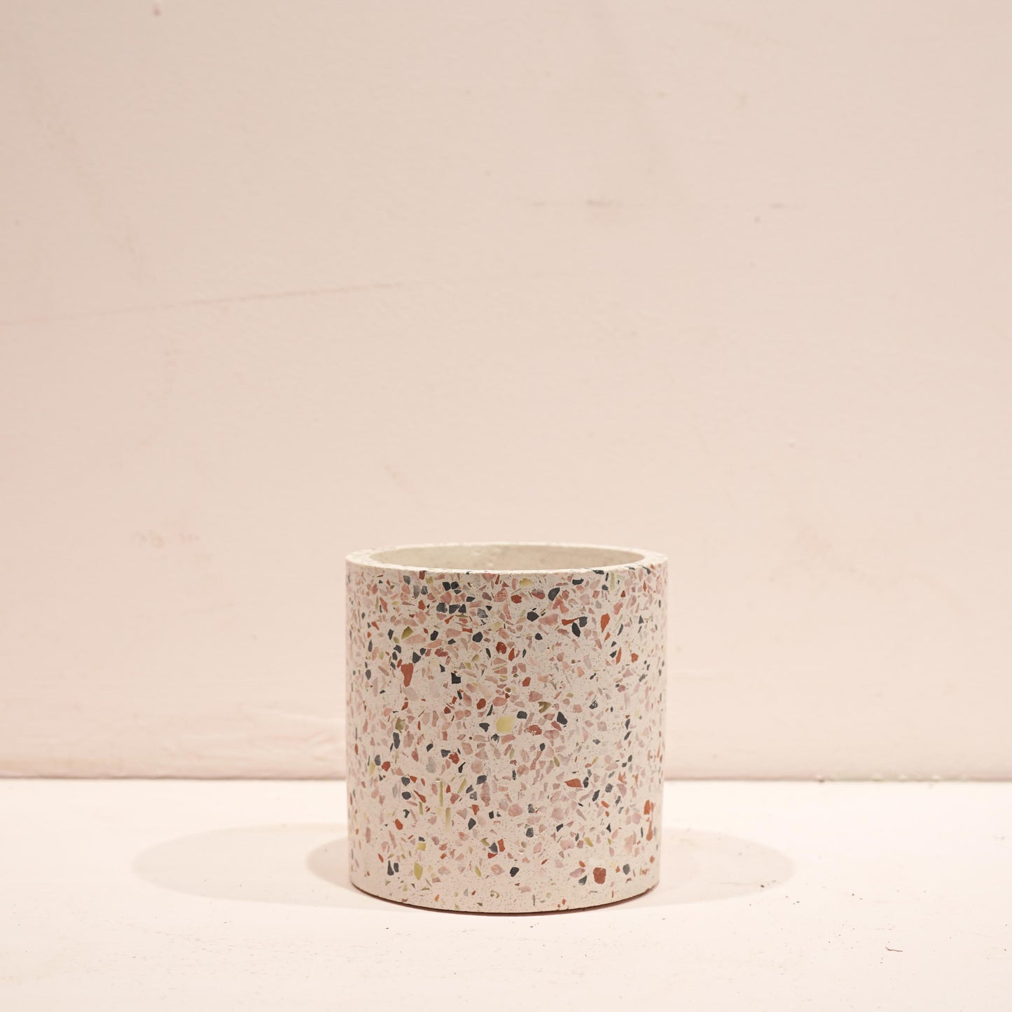 Terrazzo White Speckled Marble Planter | 4 inch Nursery Pot — empty planter, studio photo — planter for sale by Promise Supply for delivery and pickup in Toronto.