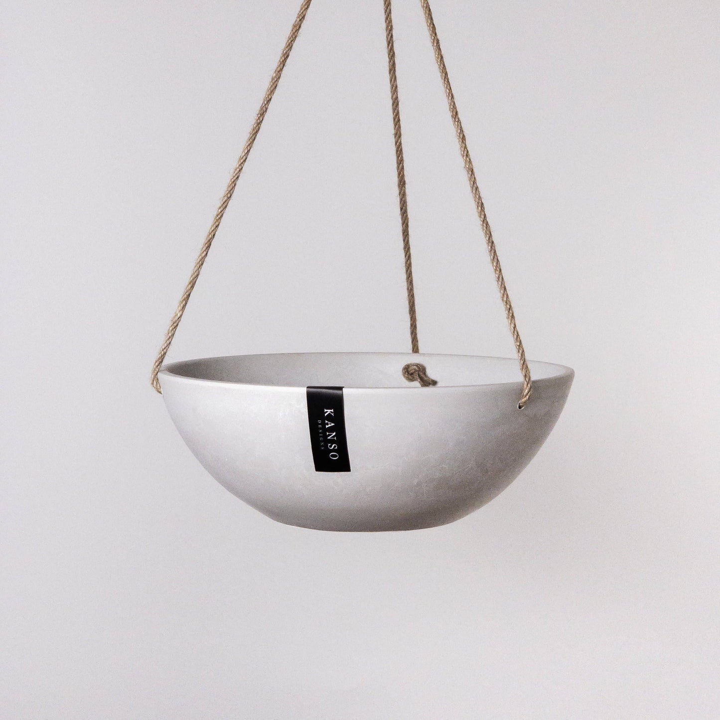 Signature Stone Hanging Planter with Drainage | 12 inch Diameter — empty planter, studio photo — planter for sale by Promise Supply for delivery and pickup in Toronto.