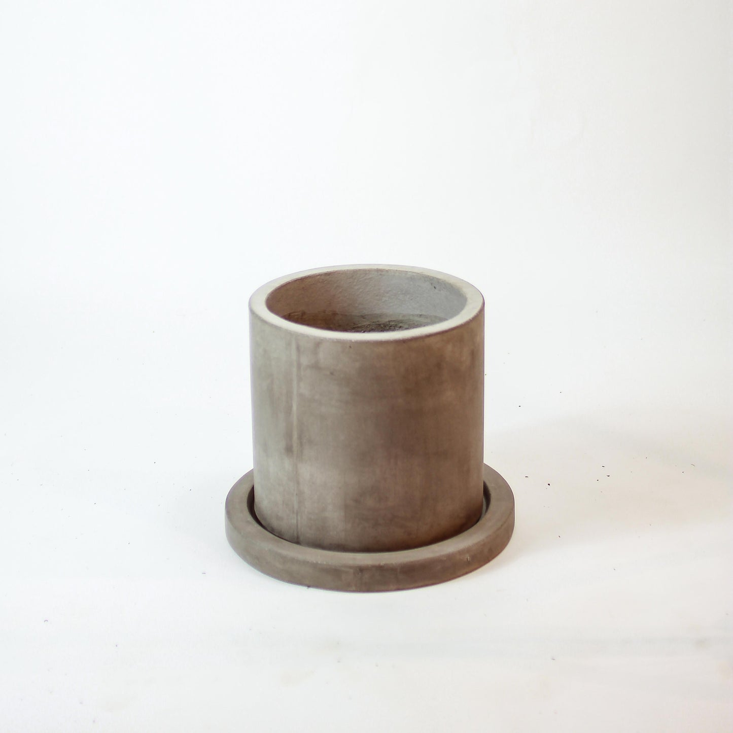 Marta Gray Concrete Planter with Drainage and Tray | 6 inch Nursery Pot — empty planter, concrete planter, studio photo — planter for sale by Promise Supply for delivery and pickup in Toronto.
