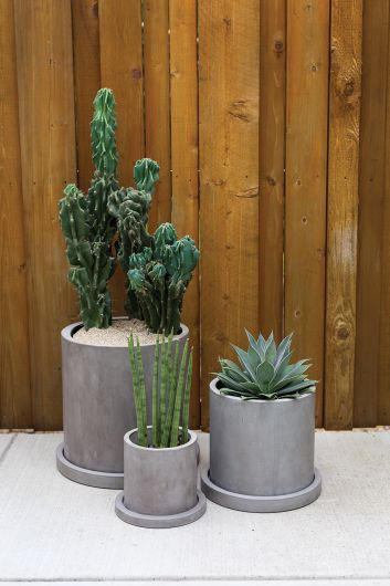 Marta Gray Concrete Planter with Drainage and Tray | 14 inch Nursery Pot — empty planter, concrete planter, studio photo — planter for sale by Promise Supply for delivery and pickup in Toronto.