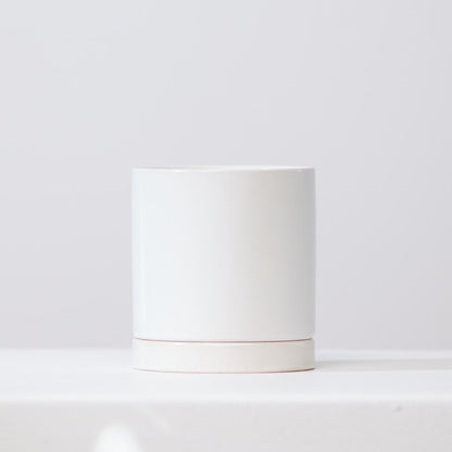 Romey Ceramic Pot with Drainage and Tray | 10 inch Diameter — empty planter, ceramic planter, studio photo — planter for sale by Promise Supply for delivery and pickup in Toronto.