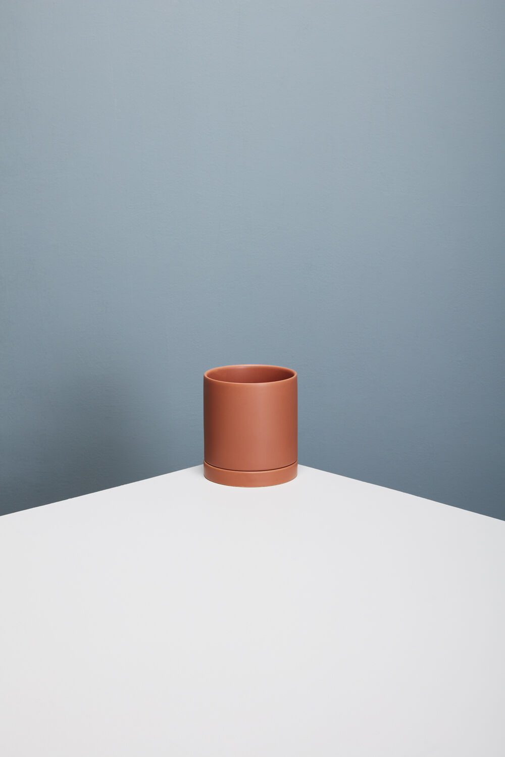 Romey Ceramic Pot with Drainage and Tray | 4 inch Diameter — empty planter, ceramic planter, studio photo — planter for sale by Promise Supply for delivery and pickup in Toronto.