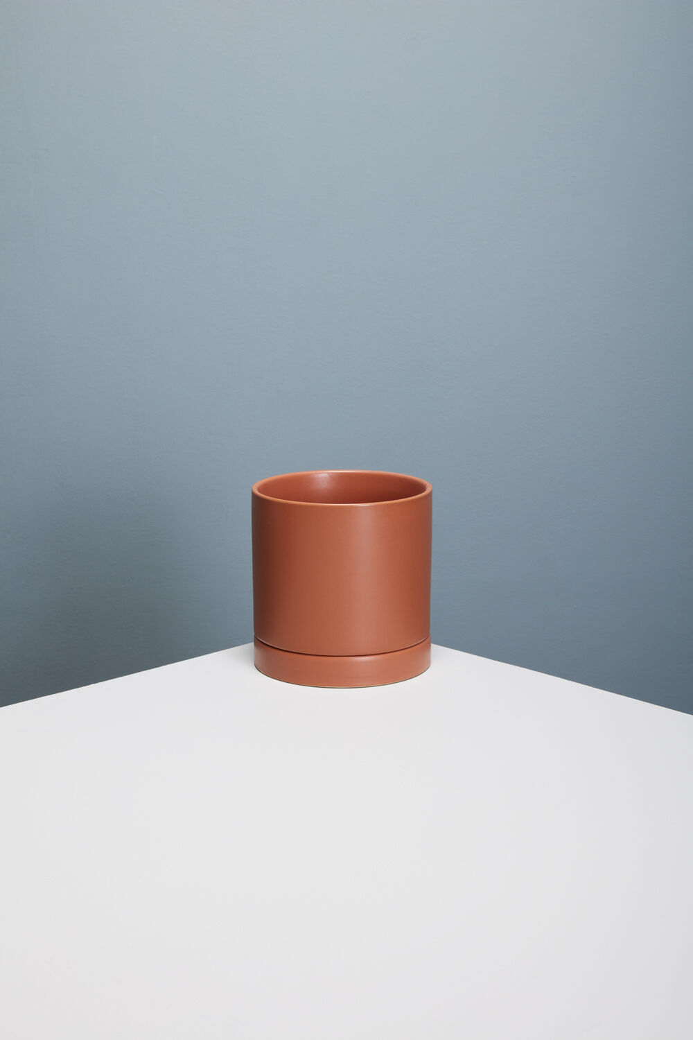 Romey Ceramic Pot with Drainage and Tray | 5 inch Diameter — empty planter, ceramic planter, studio photo — planter for sale by Promise Supply for delivery and pickup in Toronto.