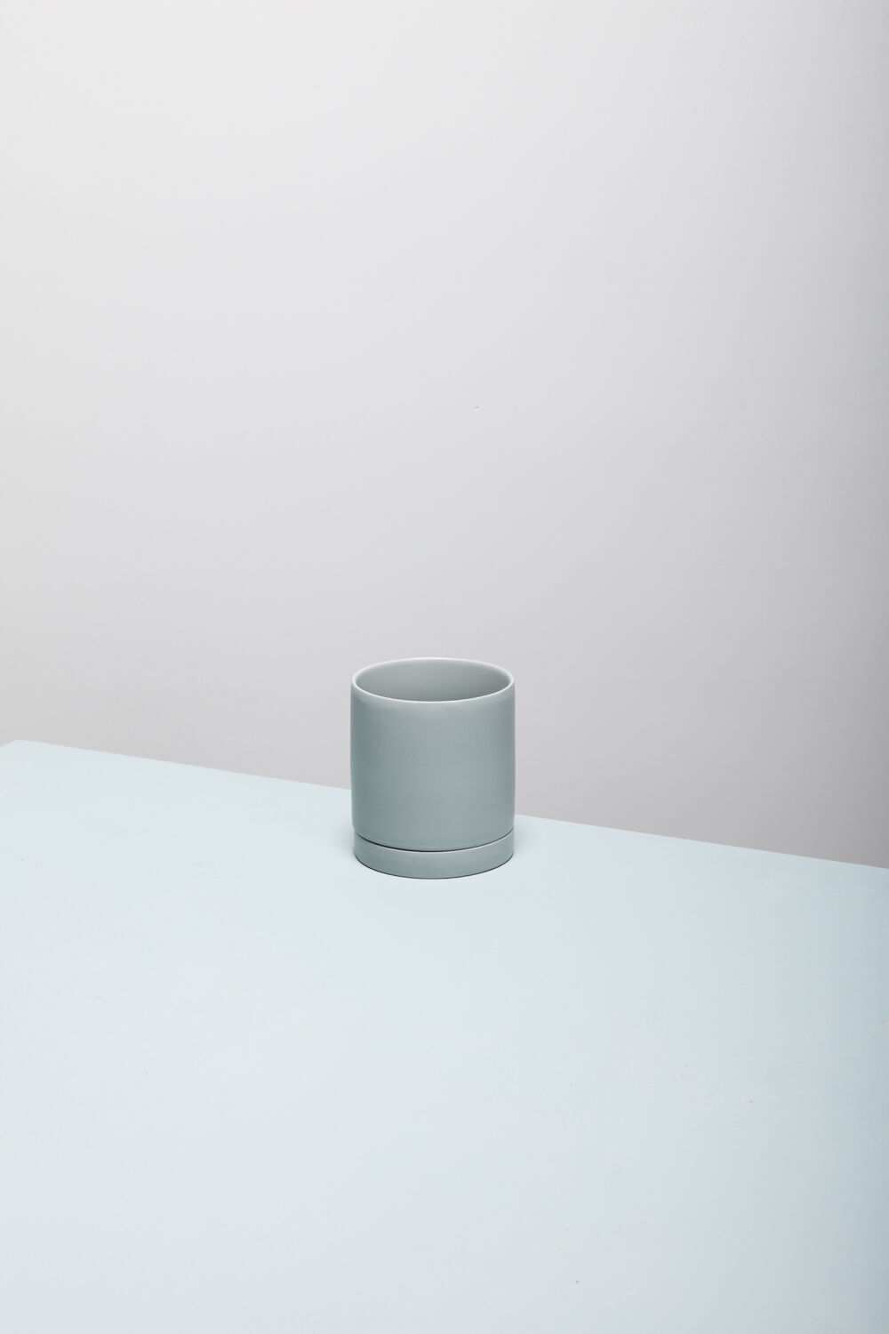 Romey Ceramic Pot with Drainage and Tray | 5 inch Diameter — empty planter, ceramic planter, studio photo — planter for sale by Promise Supply for delivery and pickup in Toronto.