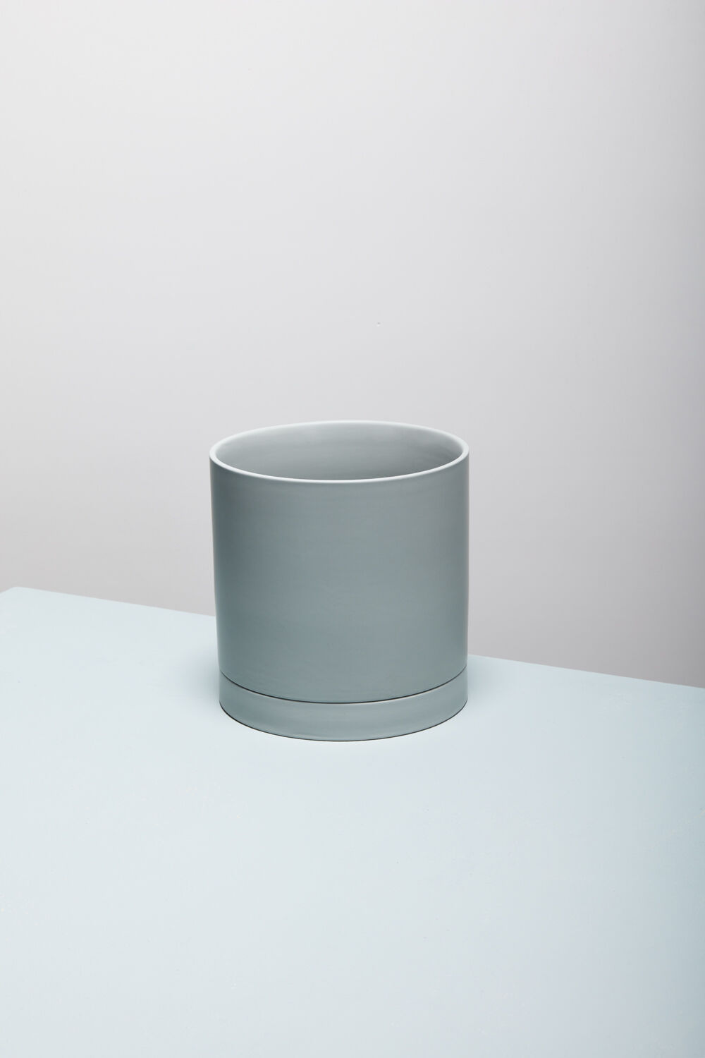 Romey Ceramic Pot with Drainage and Tray | 10 inch Diameter — empty planter, ceramic planter, studio photo — planter for sale by Promise Supply for delivery and pickup in Toronto.