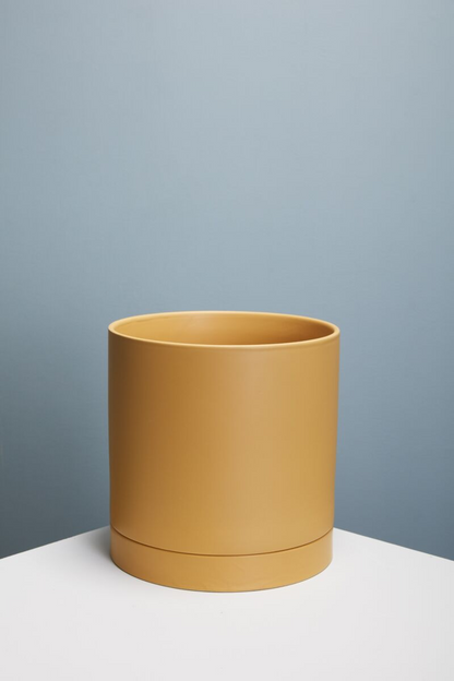 Romey Ceramic Pot with Drainage and Tray | 12 inch Diameter — empty planter, ceramic planter, studio photo — planter for sale by Promise Supply for delivery and pickup in Toronto.