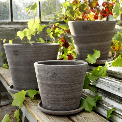 Bergs Potter Julie Raw-Spun Pot with Drainage and Tray | 17.7 Inch Diameter — empty planter, studio photo — planter for sale by Promise Supply for delivery and pickup in Toronto.