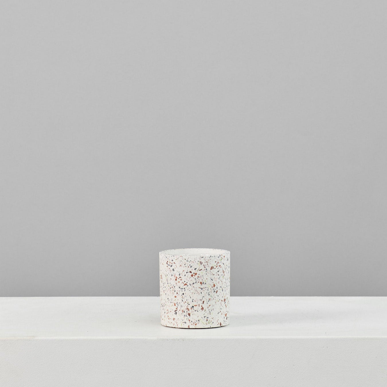 Terrazzo White Speckled Marble Planter | 4 inch Nursery Pot — empty planter, studio photo — planter for sale by Promise Supply for delivery and pickup in Toronto.