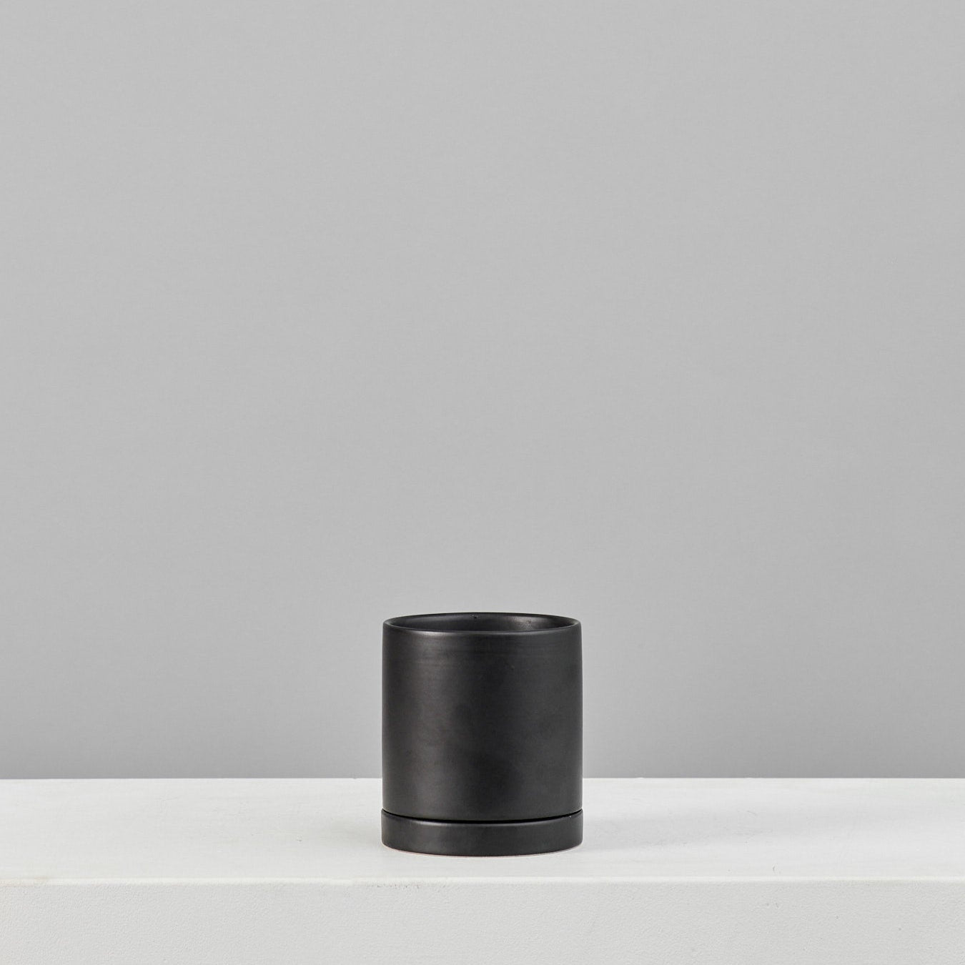 Romey Ceramic Pot with Drainage and Tray | 5 inch Diameter — empty planter, ceramic planter, studio photo — planter for sale by Promise Supply for delivery and pickup in Toronto.