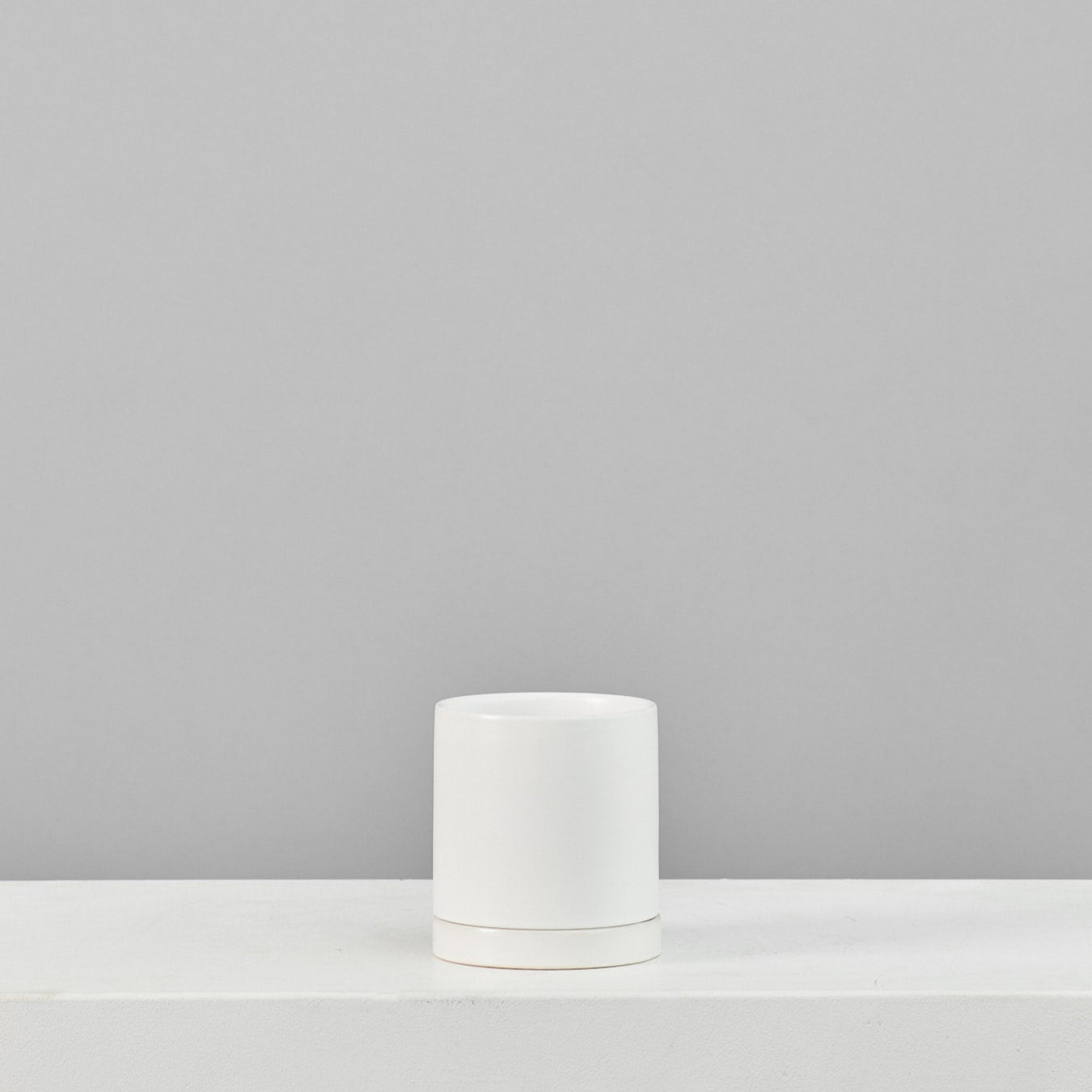 Romey Ceramic Pot with Drainage and Tray | 5 inch Diameter — empty planter, ceramic planter, studio photo — planter for sale by Promise Supply for delivery and pickup in Toronto.