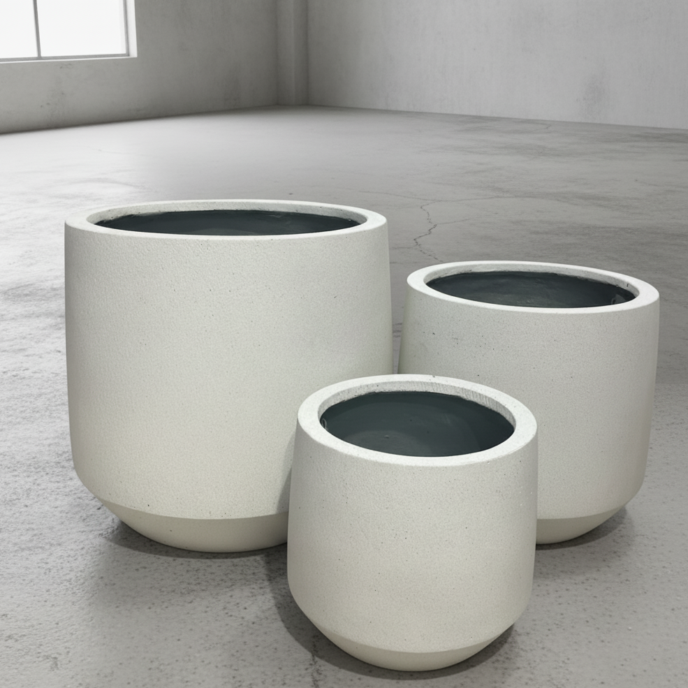 Round Ficonstone Tapered Base Planter | 12.6 x 11.2 inches — empty planter, studio photo — planter for sale by Promise Supply for delivery and pickup in Toronto.