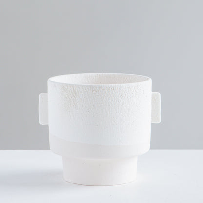 Milton Textured Off White Planter | 5 inch Nursery Pot — empty planter, studio photo — planter for sale by Promise Supply for delivery and pickup in Toronto.
